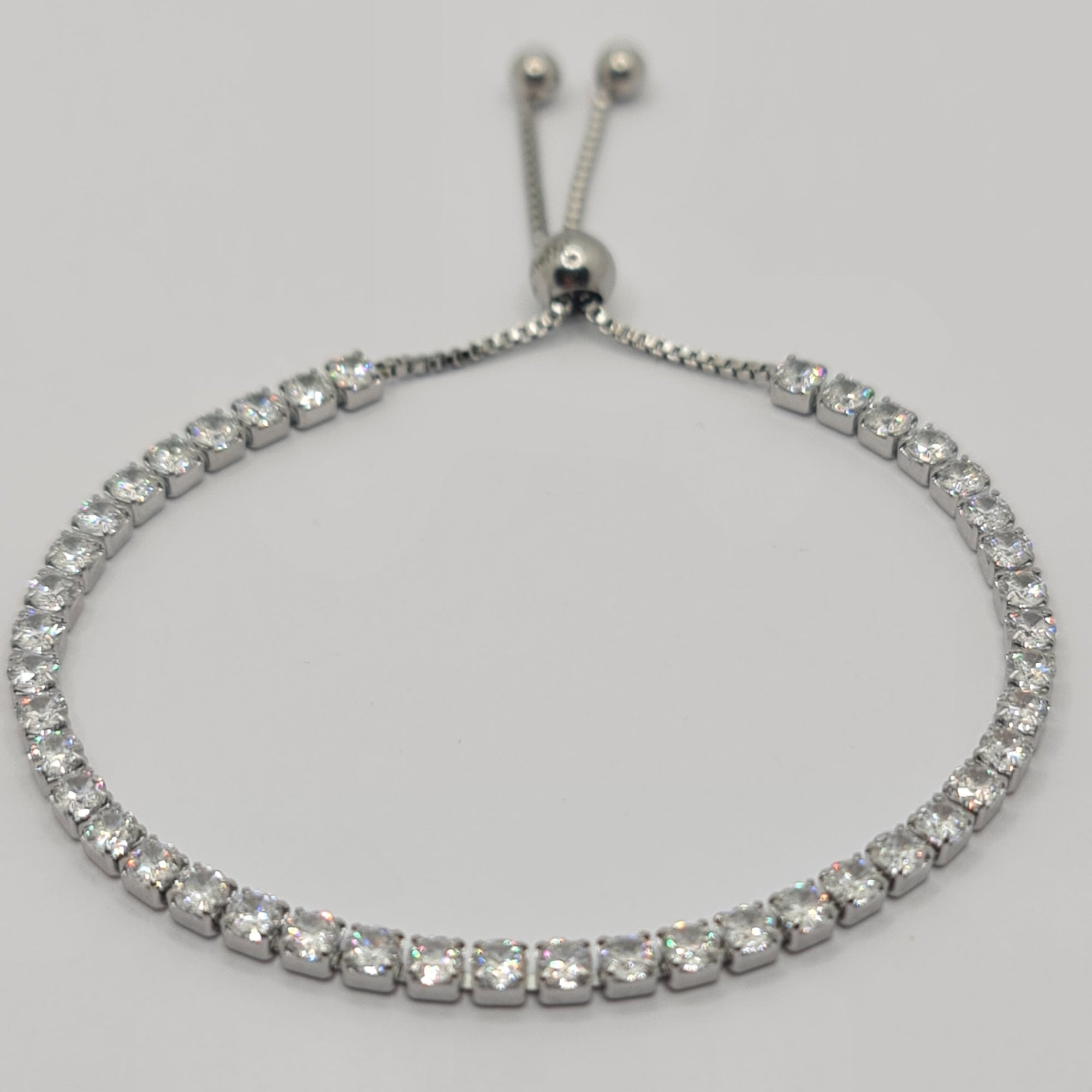 BRACCIALE ACCIAIO TENNIS E ZIRCONI BIANCHI MM 3,00 CHIUSURA A SCORRERE