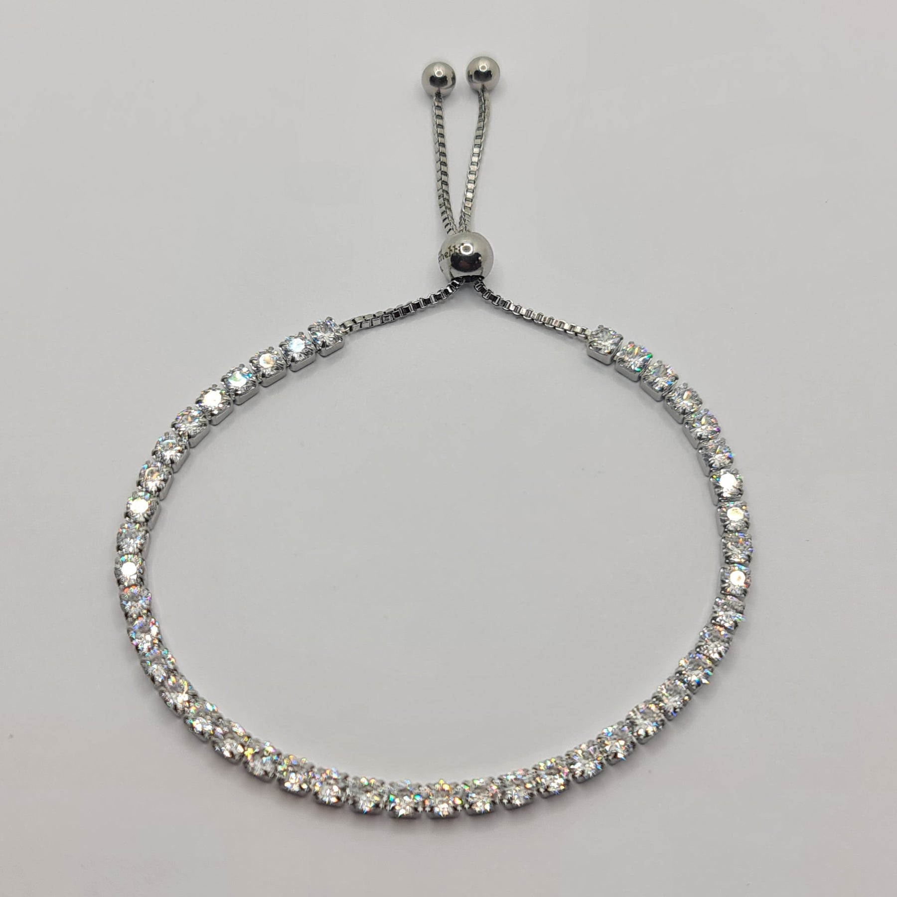 BRACCIALE ACCIAIO TENNIS E ZIRCONI BIANCHI MM 3,00 CHIUSURA A SCORRERE
