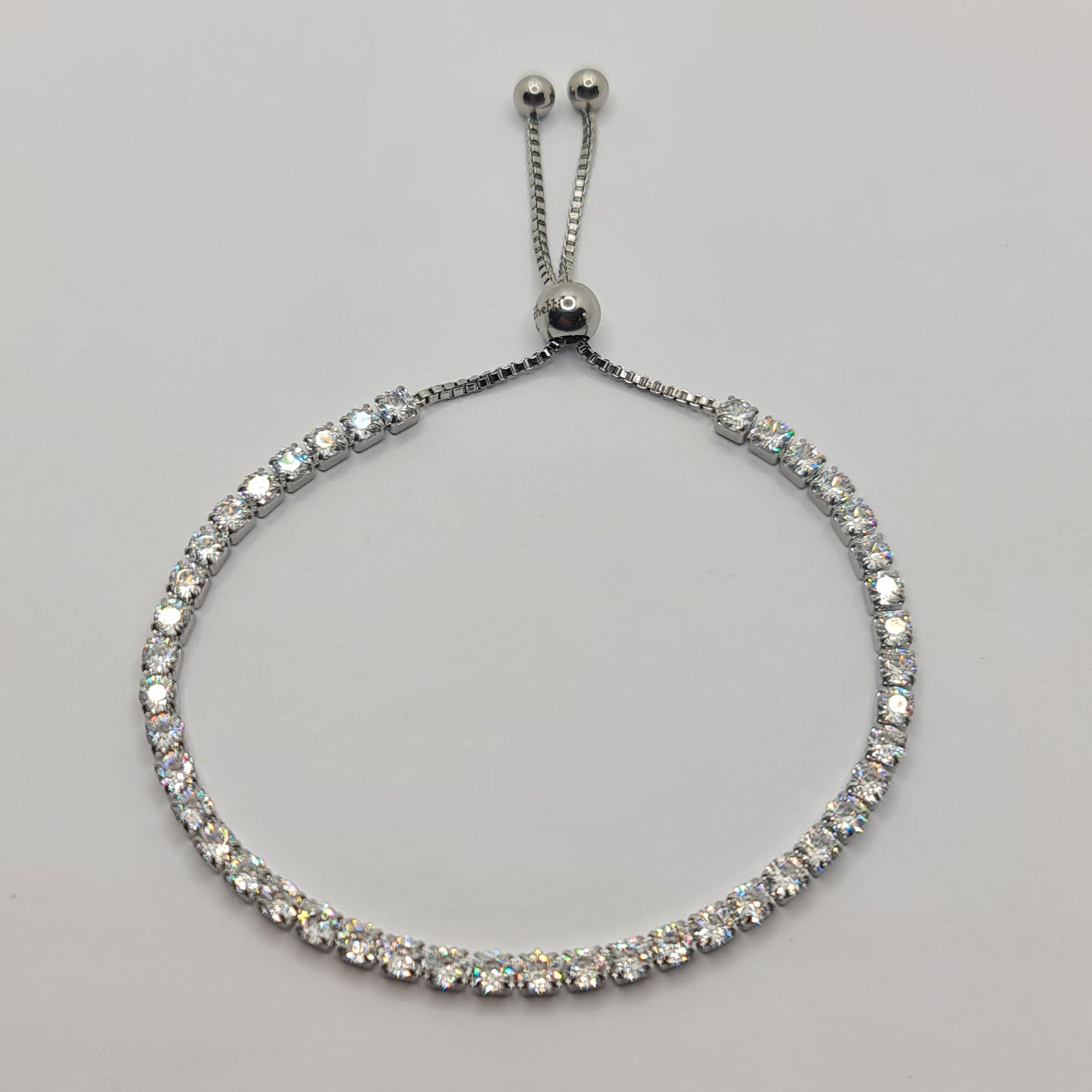 BRACCIALE ACCIAIO TENNIS E ZIRCONI BIANCHI MM 3,00 CHIUSURA A SCORRERE