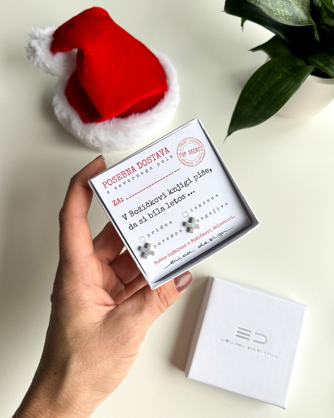 Earrings XX on a festive card for the good or naughty