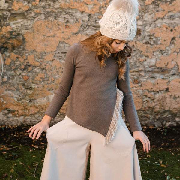 SWEATER WITH SIDE SLIT DETAIL AND FRINGE