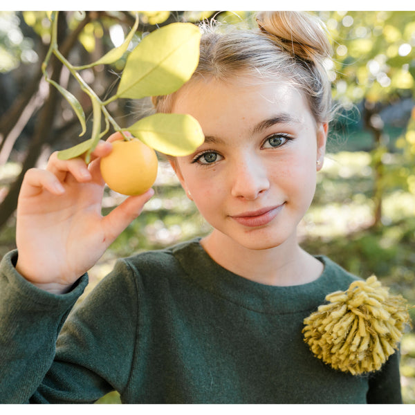 WARM COTTON SWEATER WITH POM POM
