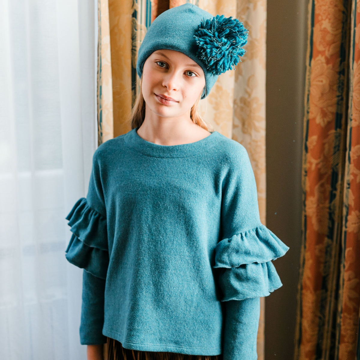 PETROL BLUE SWEATER WITH RUFFLES