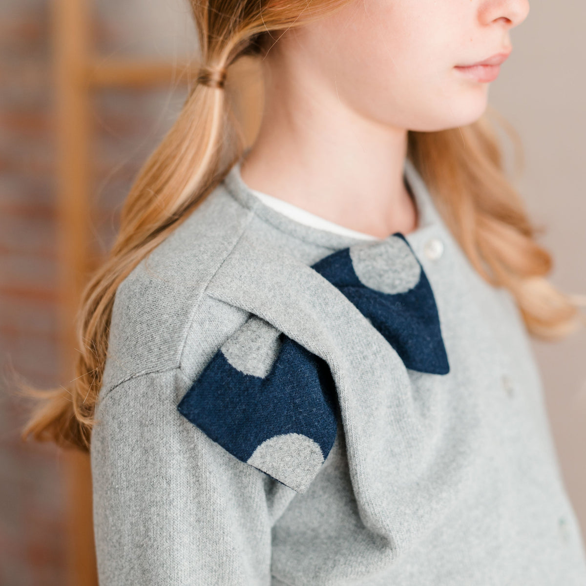 CARDIGAN WITH POLKA DOT BOW