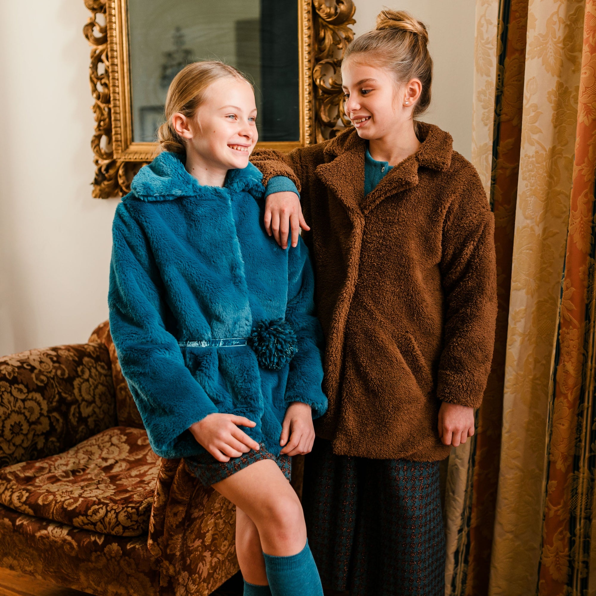 ECO FUR COAT WITH POM POM BELT