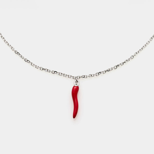 Fine steel rolo chain necklace with central red enameled steel horn pendant