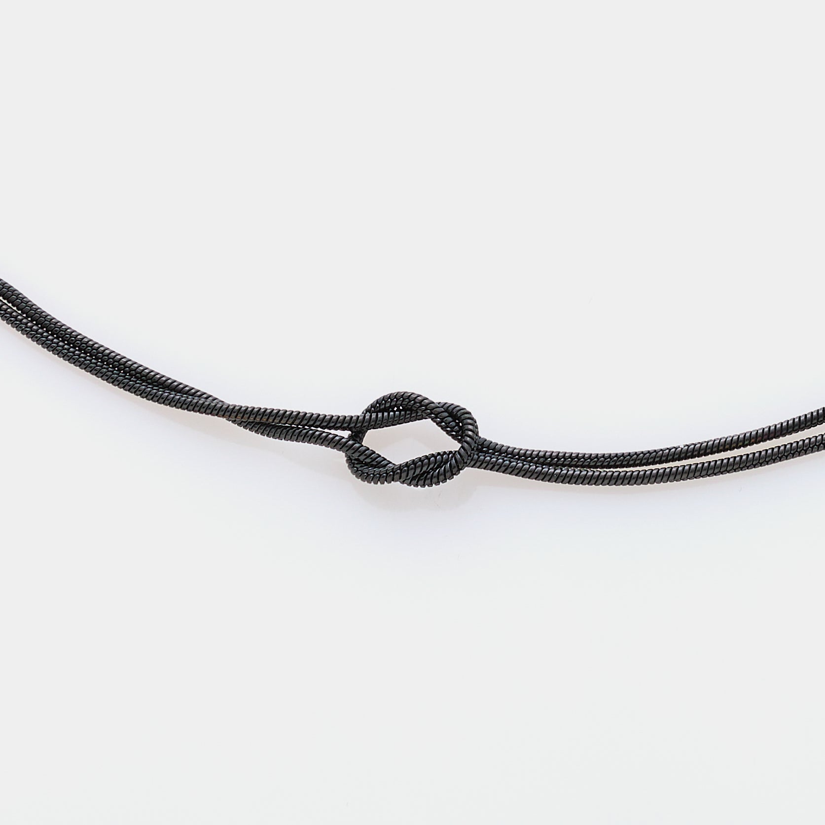 Soft infinite knot necklace in steel