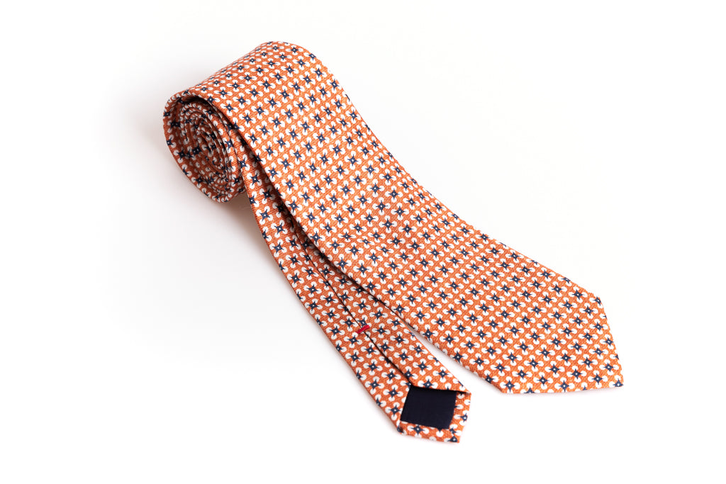 Orange tie with pure silk pattern