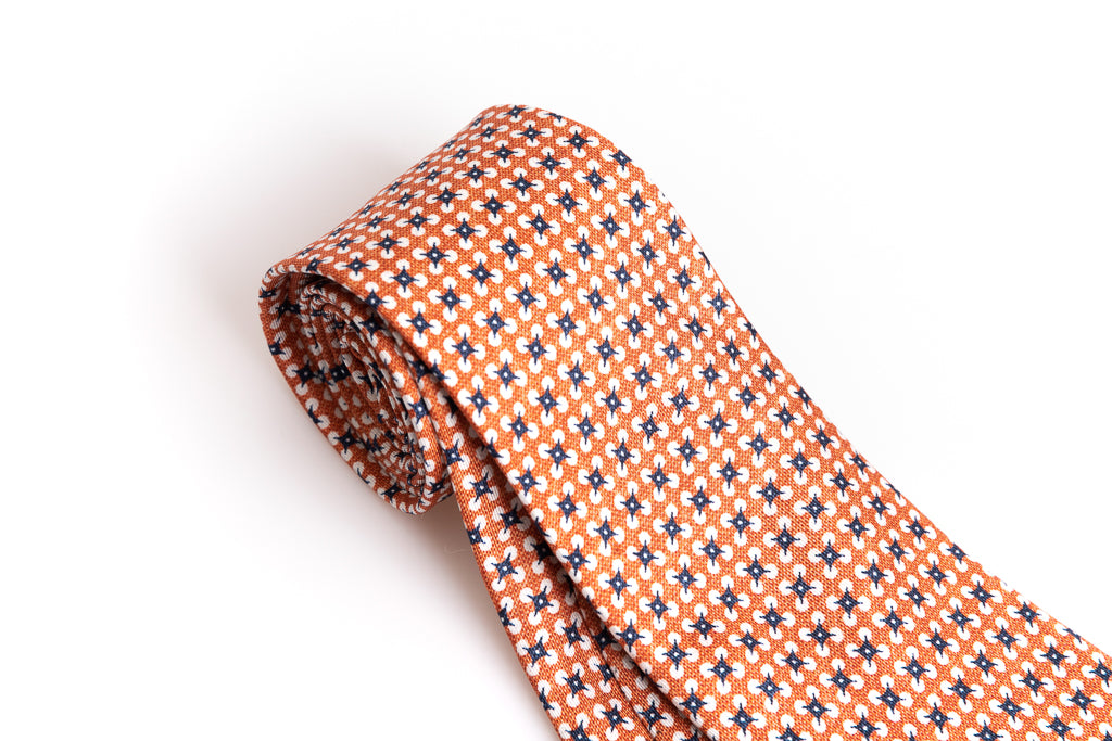 Orange tie with pure silk pattern