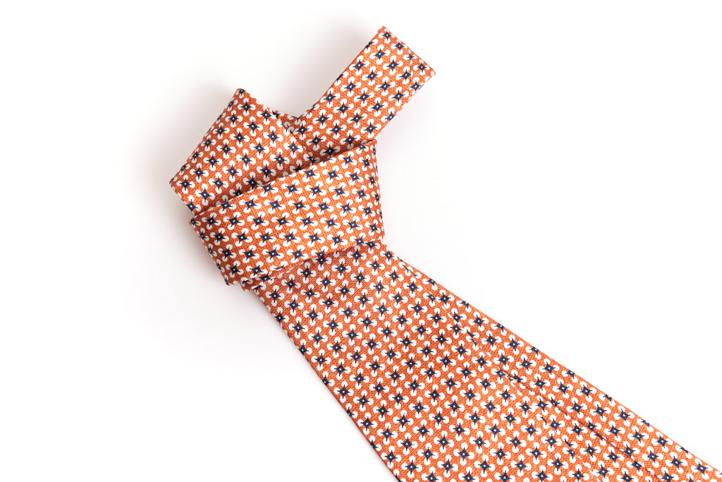 Orange tie with pure silk pattern