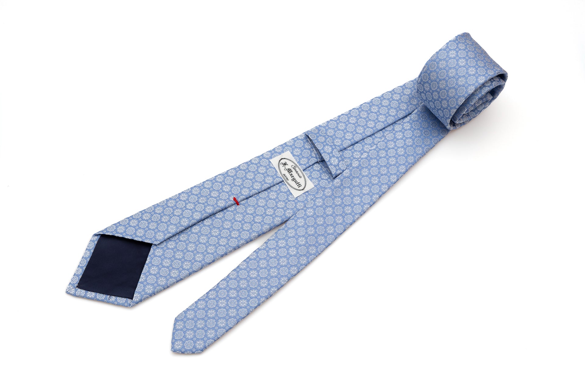 Light blue tie with embroidered flowers pure silk