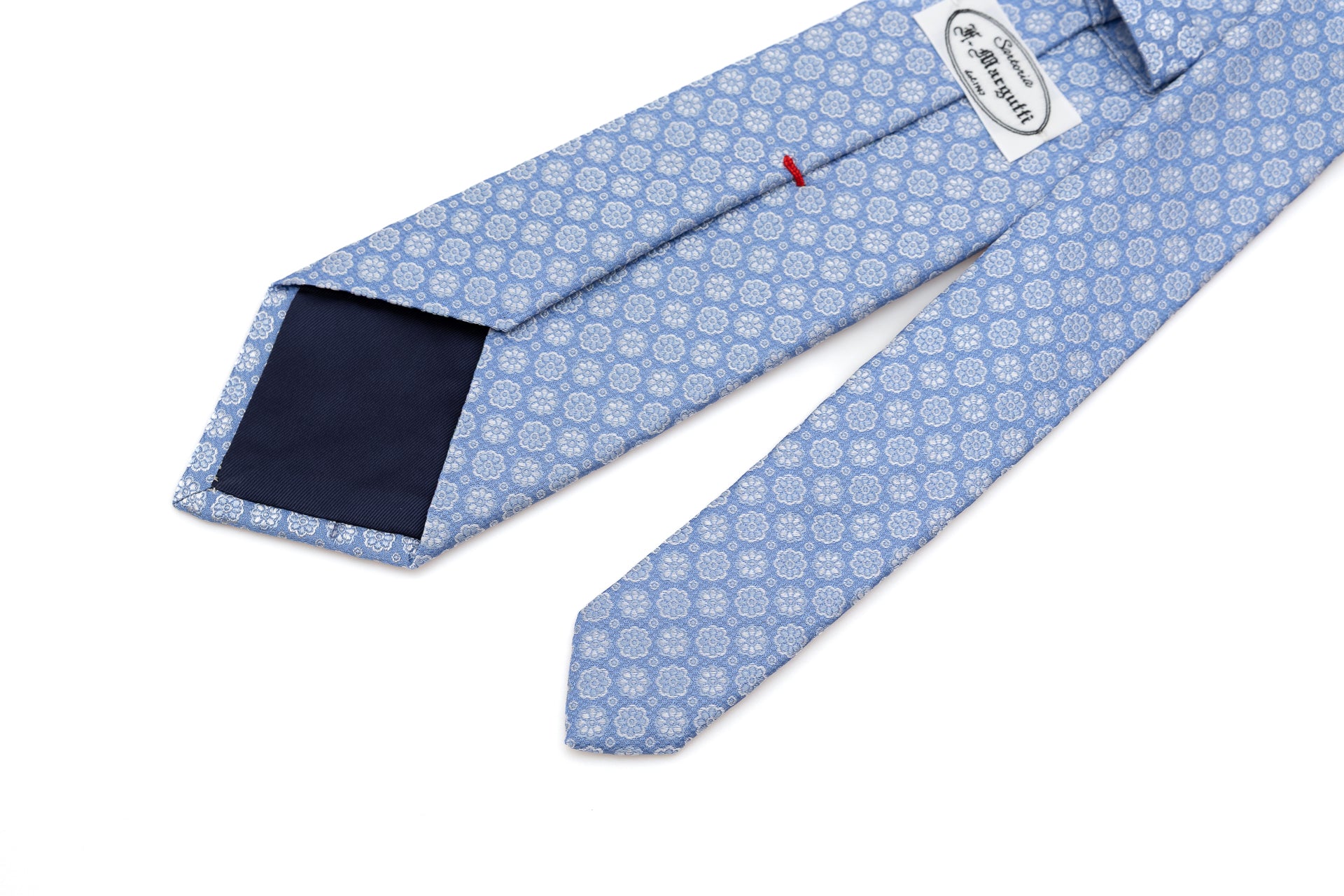 Light blue tie with embroidered flowers pure silk