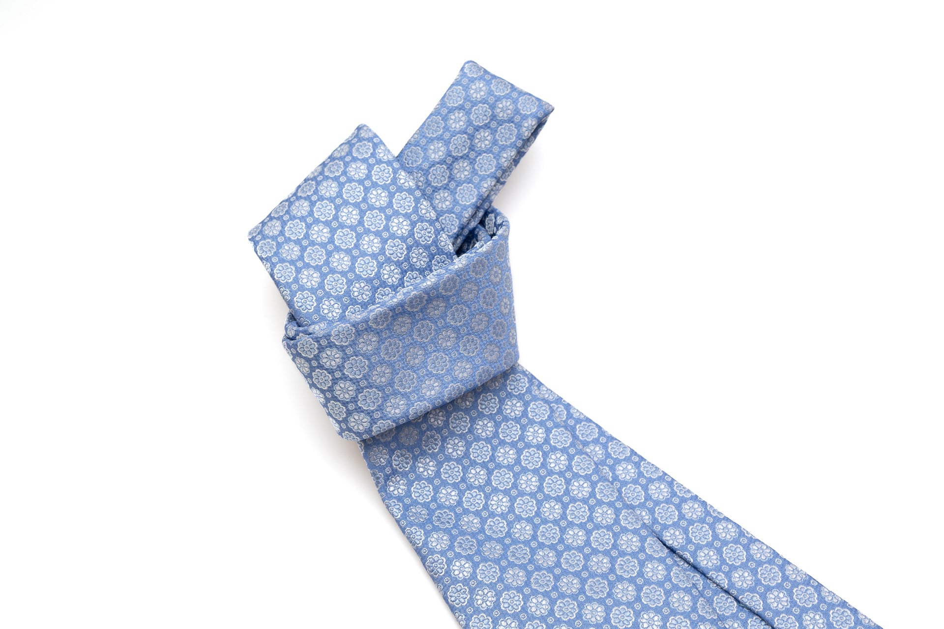 Light blue tie with embroidered flowers pure silk