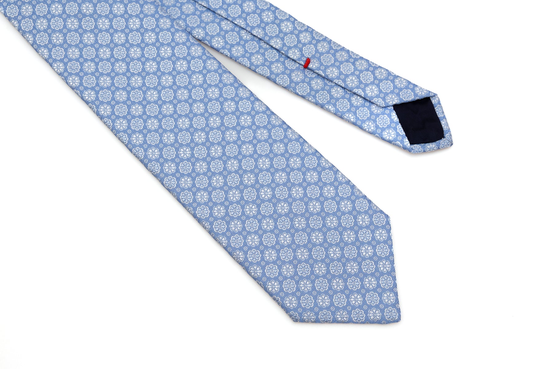 Light blue tie with embroidered flowers pure silk