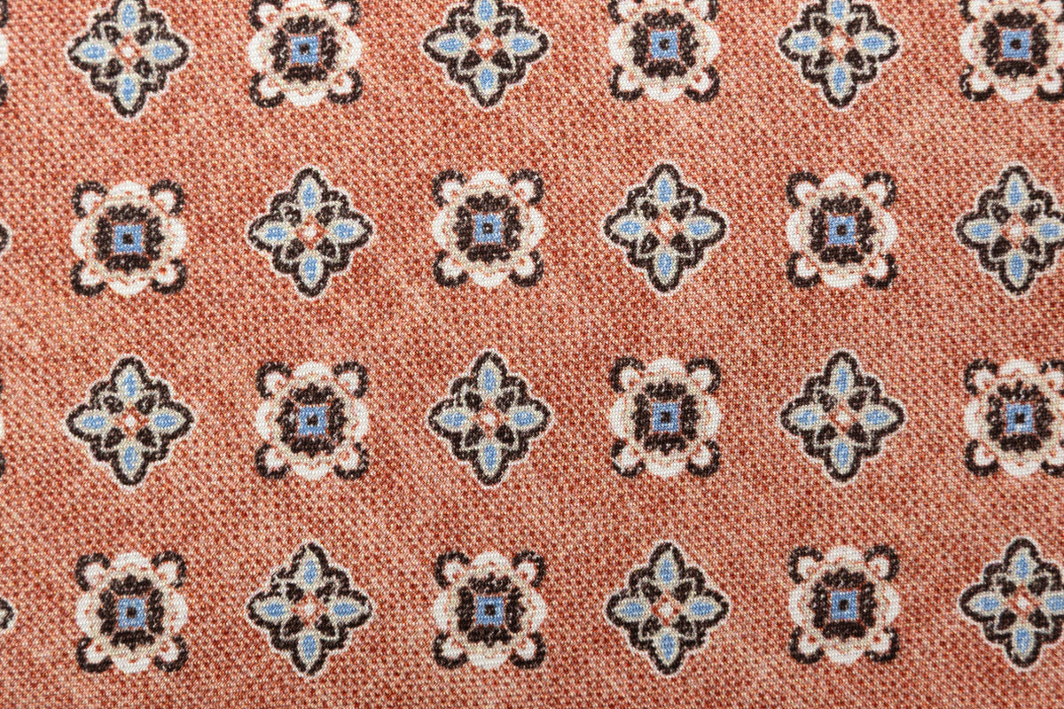 Oranje stropdas met licht geometrisch patroon van pure zijde