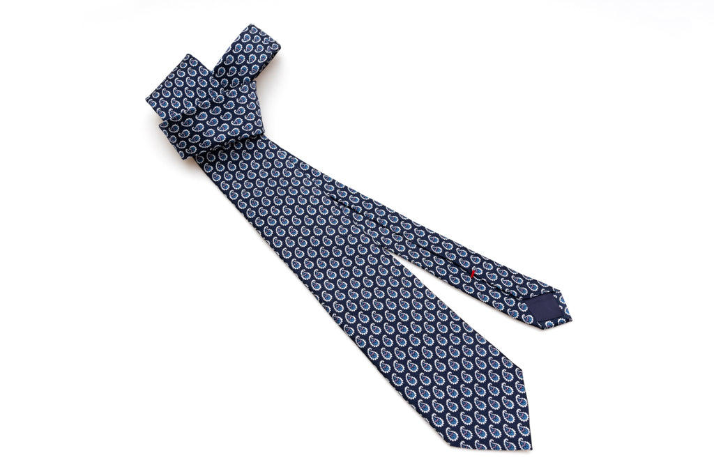 Blue tie with patterned drops in pure silk