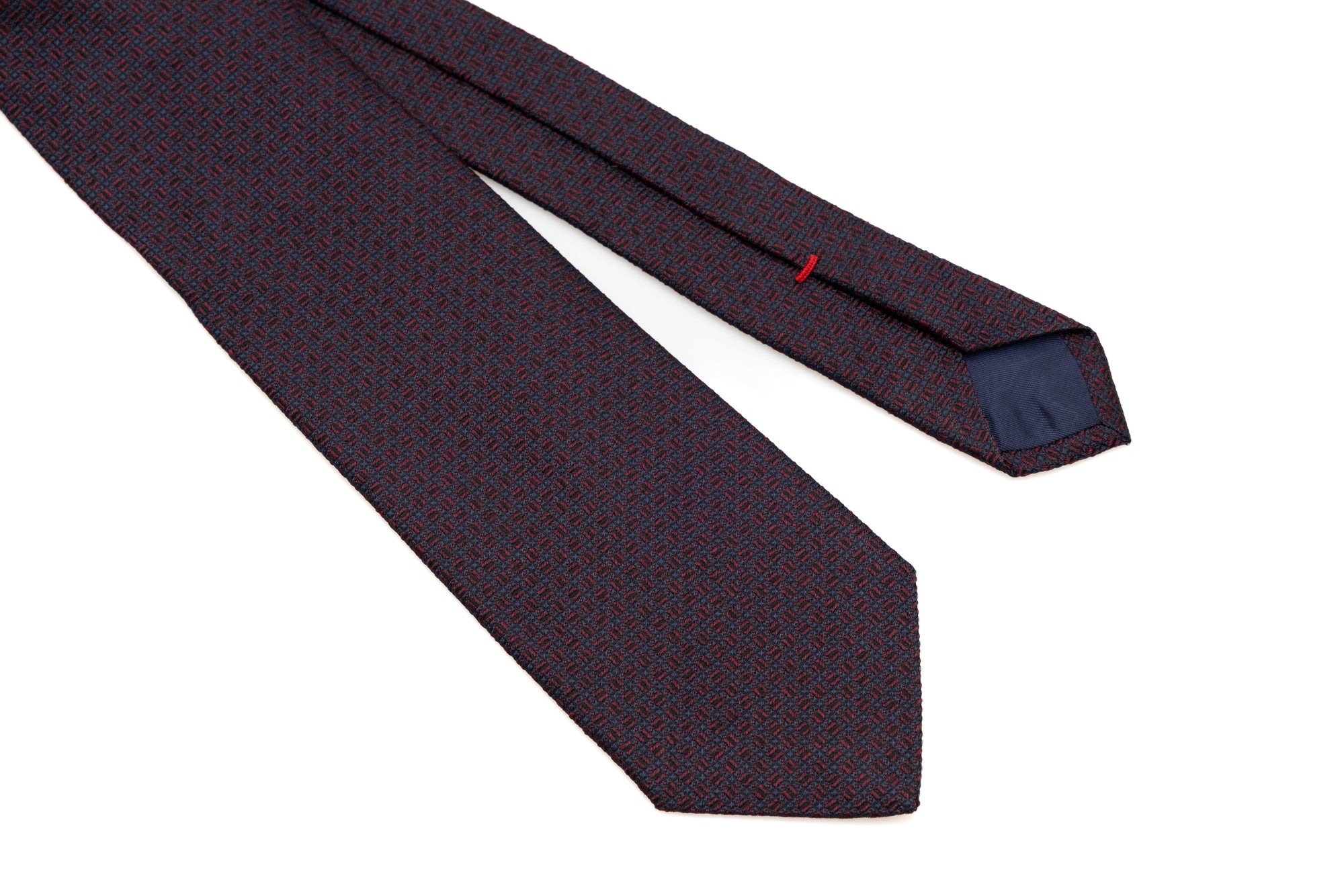 Embroidered blue and red tie in pure silk