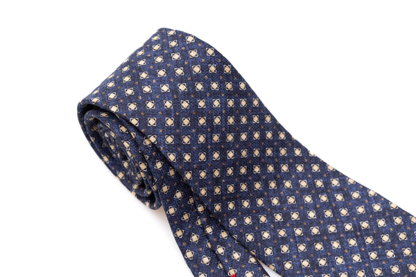 Cravate bleue à motif géométrique léger 100% soie