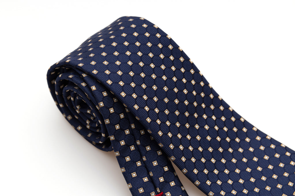Blue tie with beige geometry in pure silk