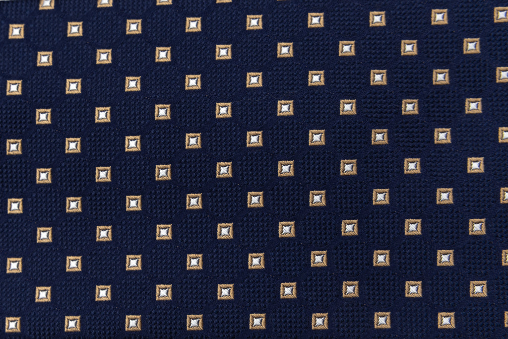Blue tie with beige geometry in pure silk