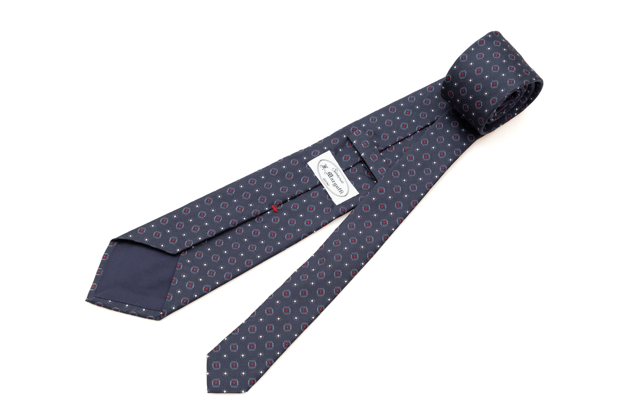 Cravate bleue avec motif rouge en pure soie