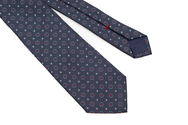 Cravate bleue avec motif rouge en pure soie