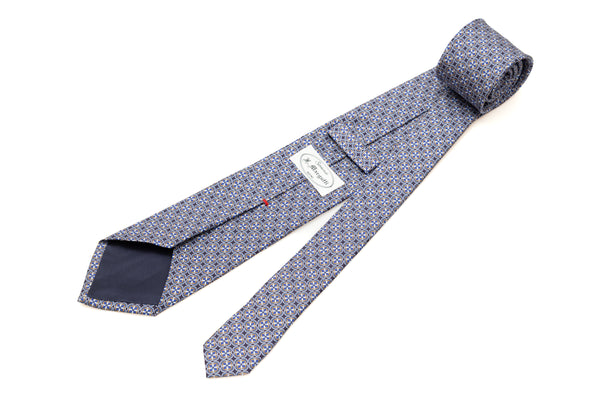 Light geometric patterned blue tie in pure silk