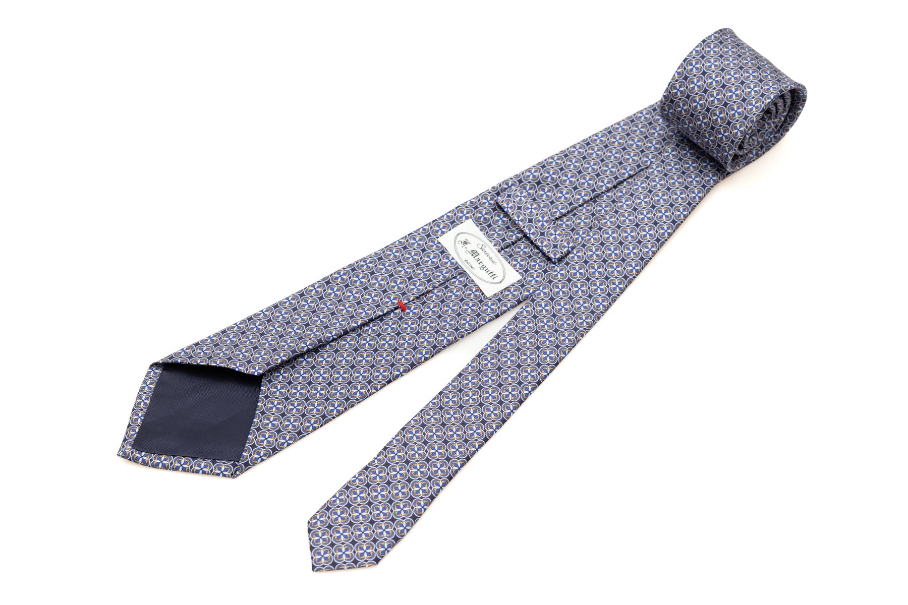 Light geometric patterned blue tie in pure silk