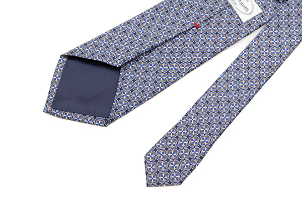 Light geometric patterned blue tie in pure silk