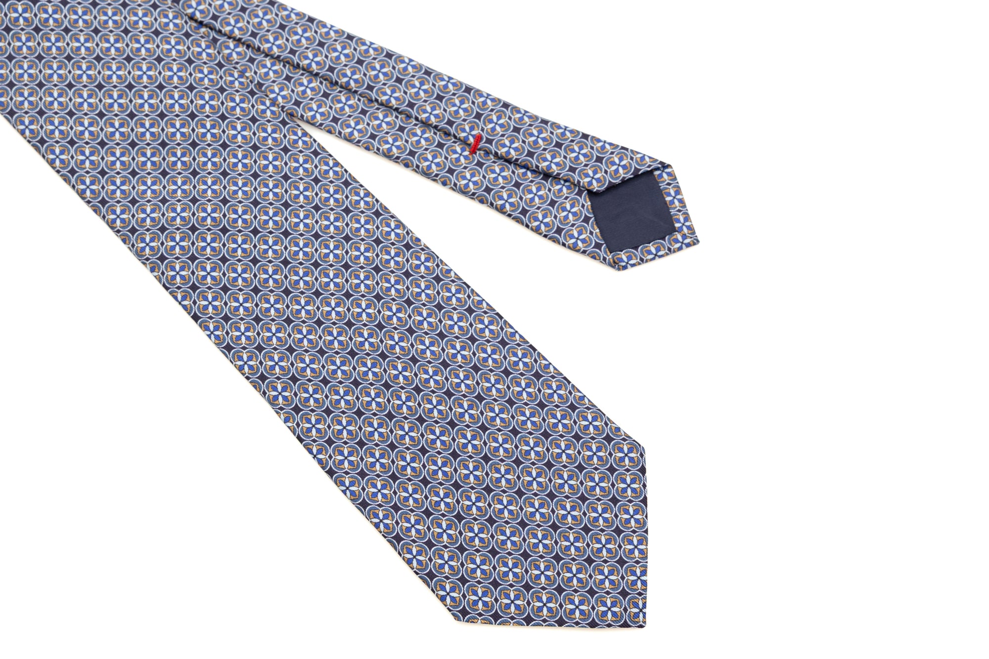 Light geometric patterned blue tie in pure silk
