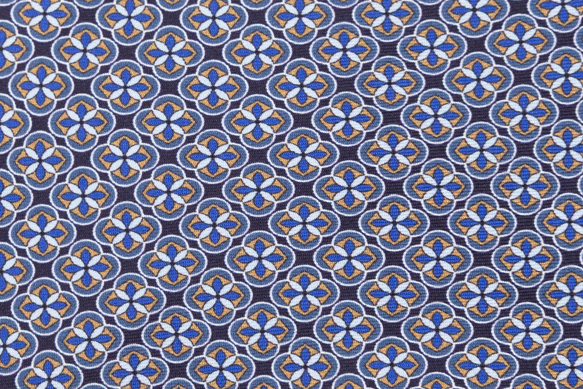 Light geometric patterned blue tie in pure silk