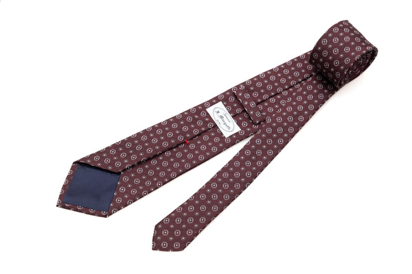 Burgundy tie in geometric pattern pure silk