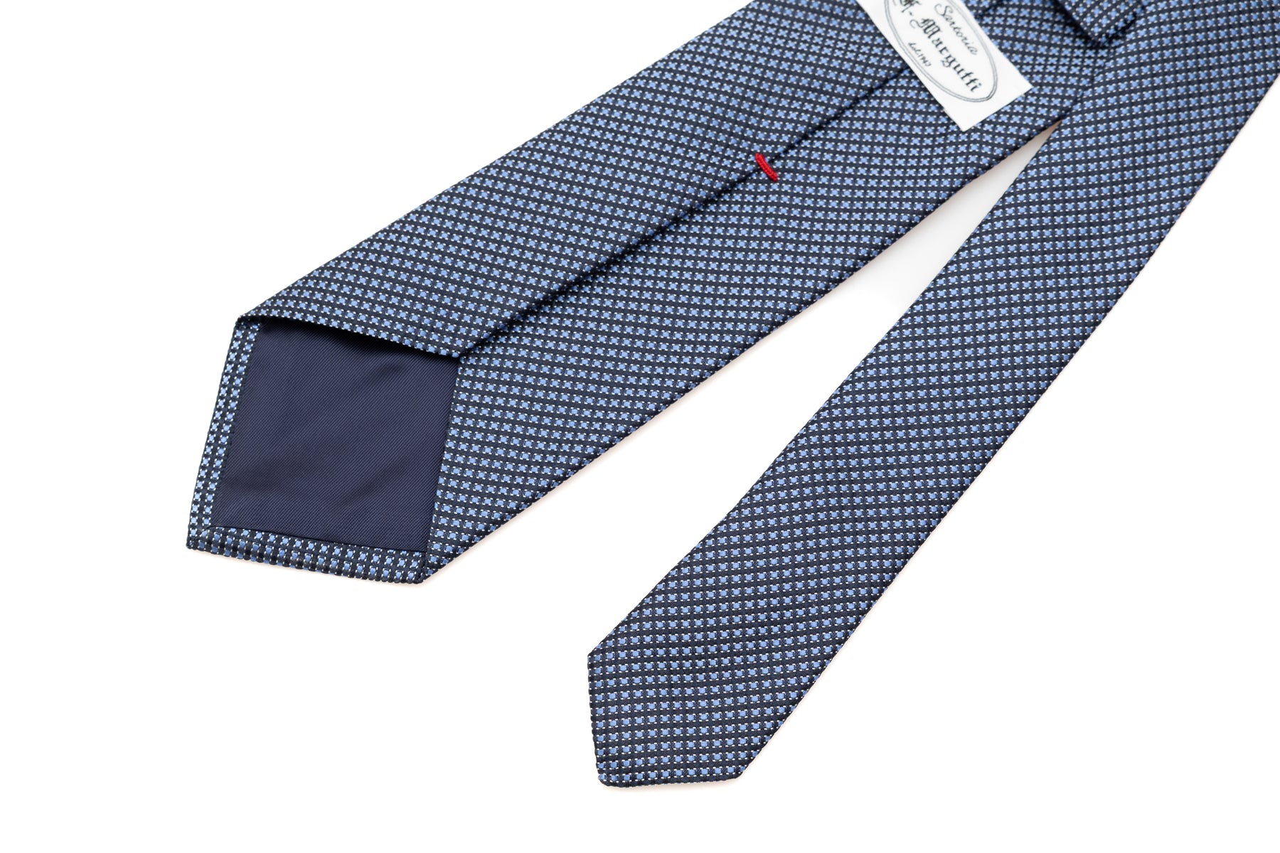 Blue tie with light blue embroidered pattern 100% silk