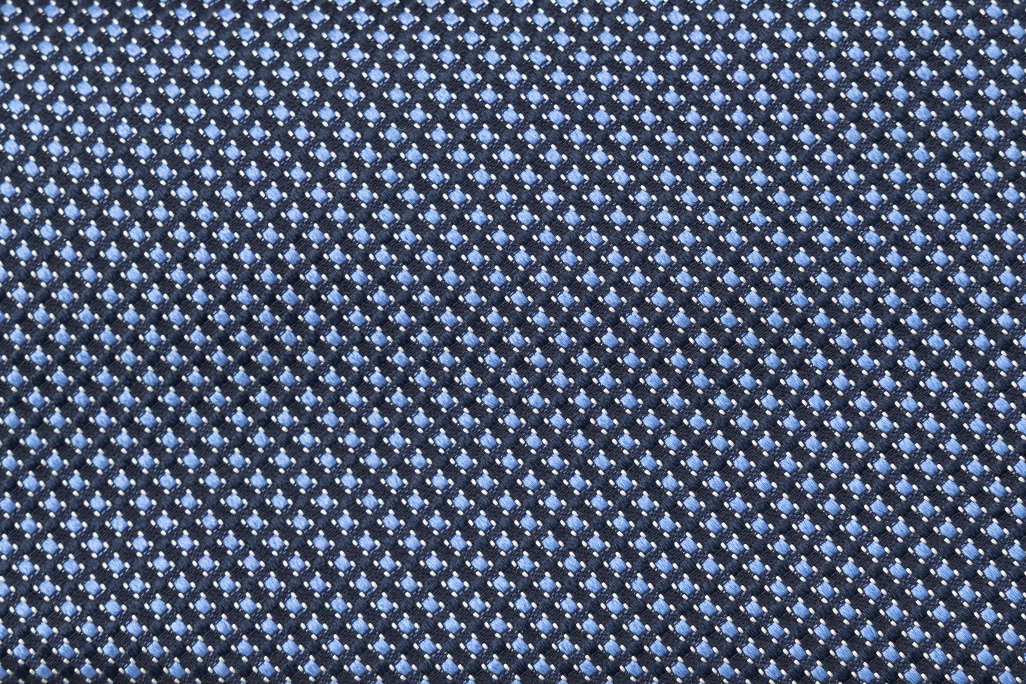 Cravatta blu con motivo ricamato azzurro 100% seta