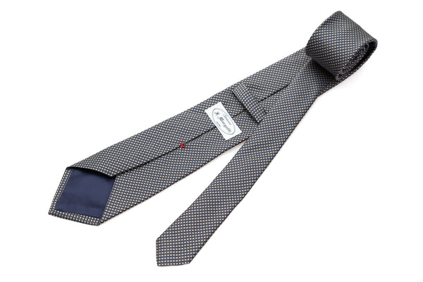 Blue tie with embroidered yellow polka dots