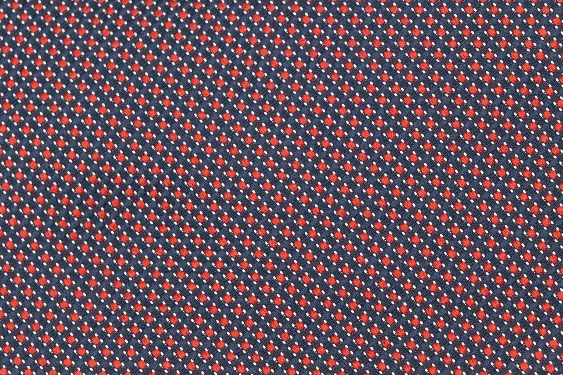Corbata de fondo azul con lunares rojos bordados de seda pura