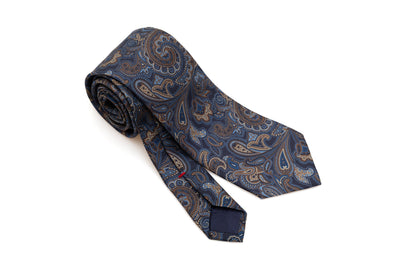 Cravate à fond bleu avec motif paisley en soie pure