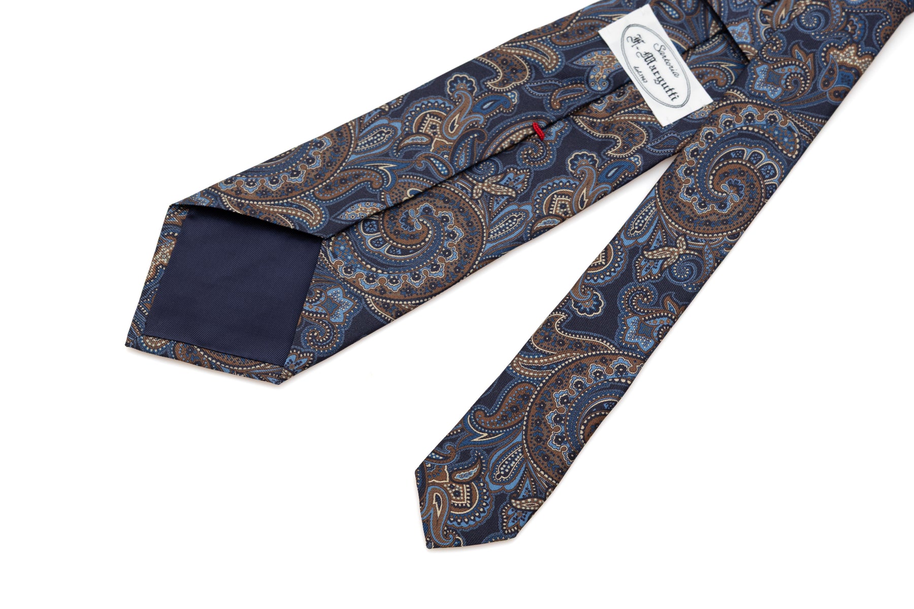 Cravate à fond bleu avec motif paisley en soie pure