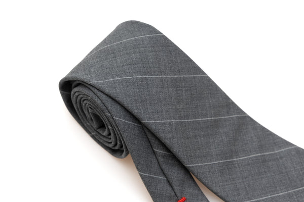 Grijze stropdas met dunne streep van puur wol