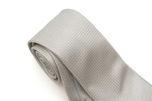 Embroidered pearl gray tie in pure silk