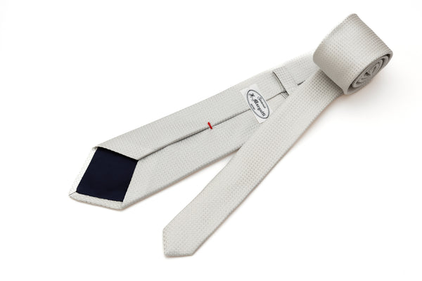 Embroidered pearl gray tie in pure silk