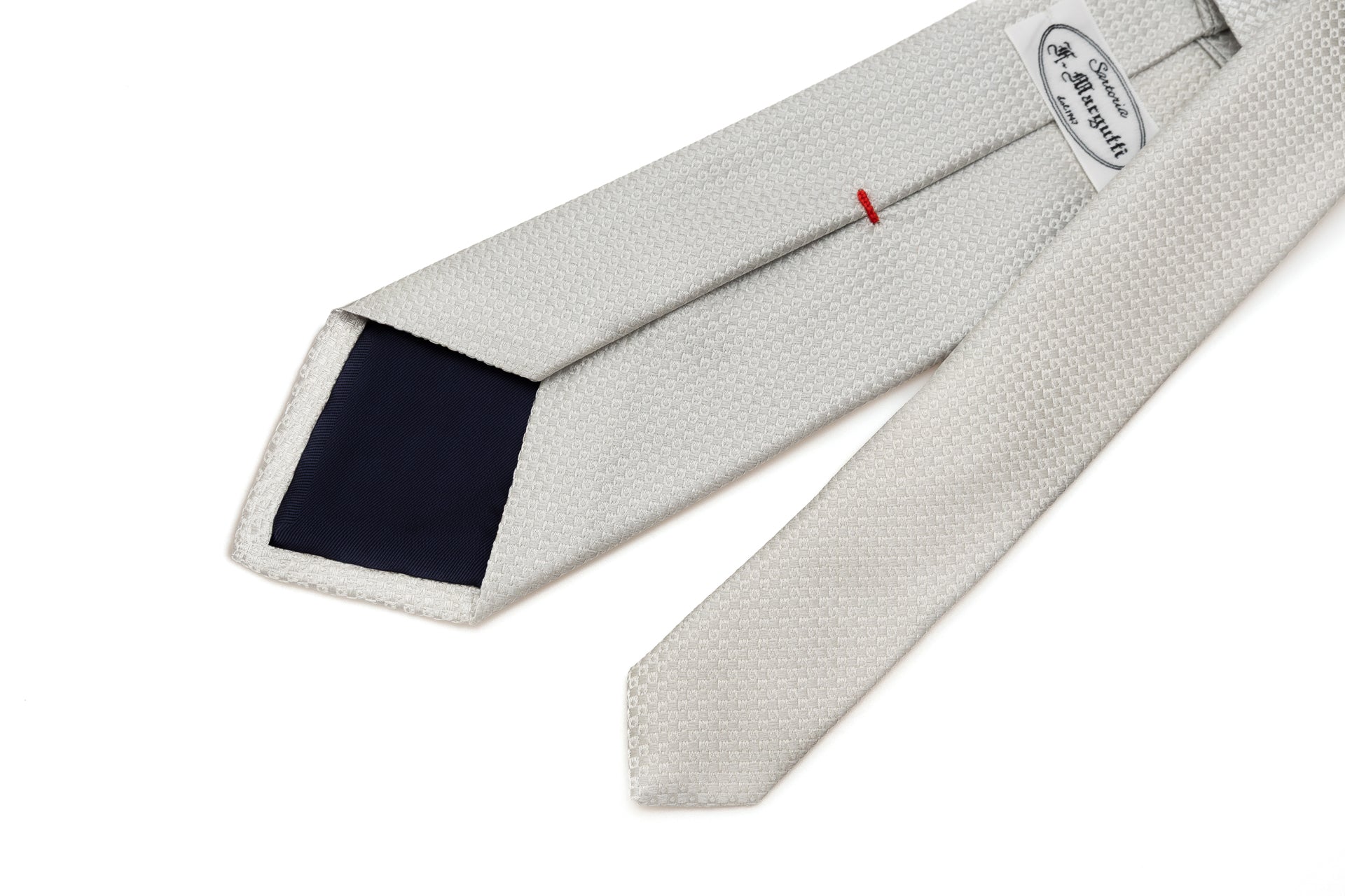 Embroidered pearl gray tie in pure silk