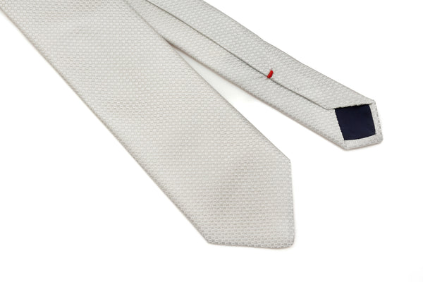 Embroidered pearl gray tie in pure silk