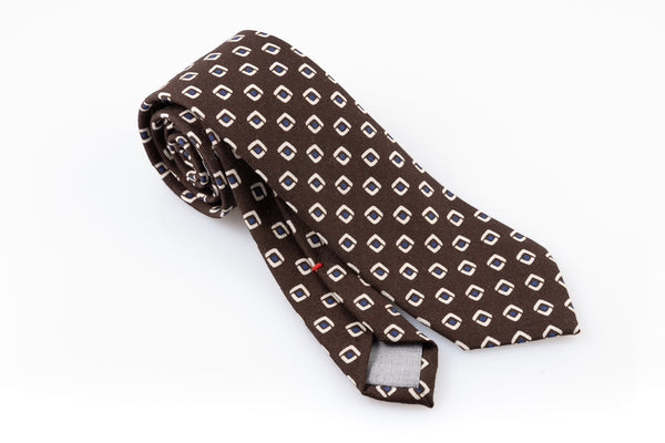 Brown tie with geometric pattern in pure wool