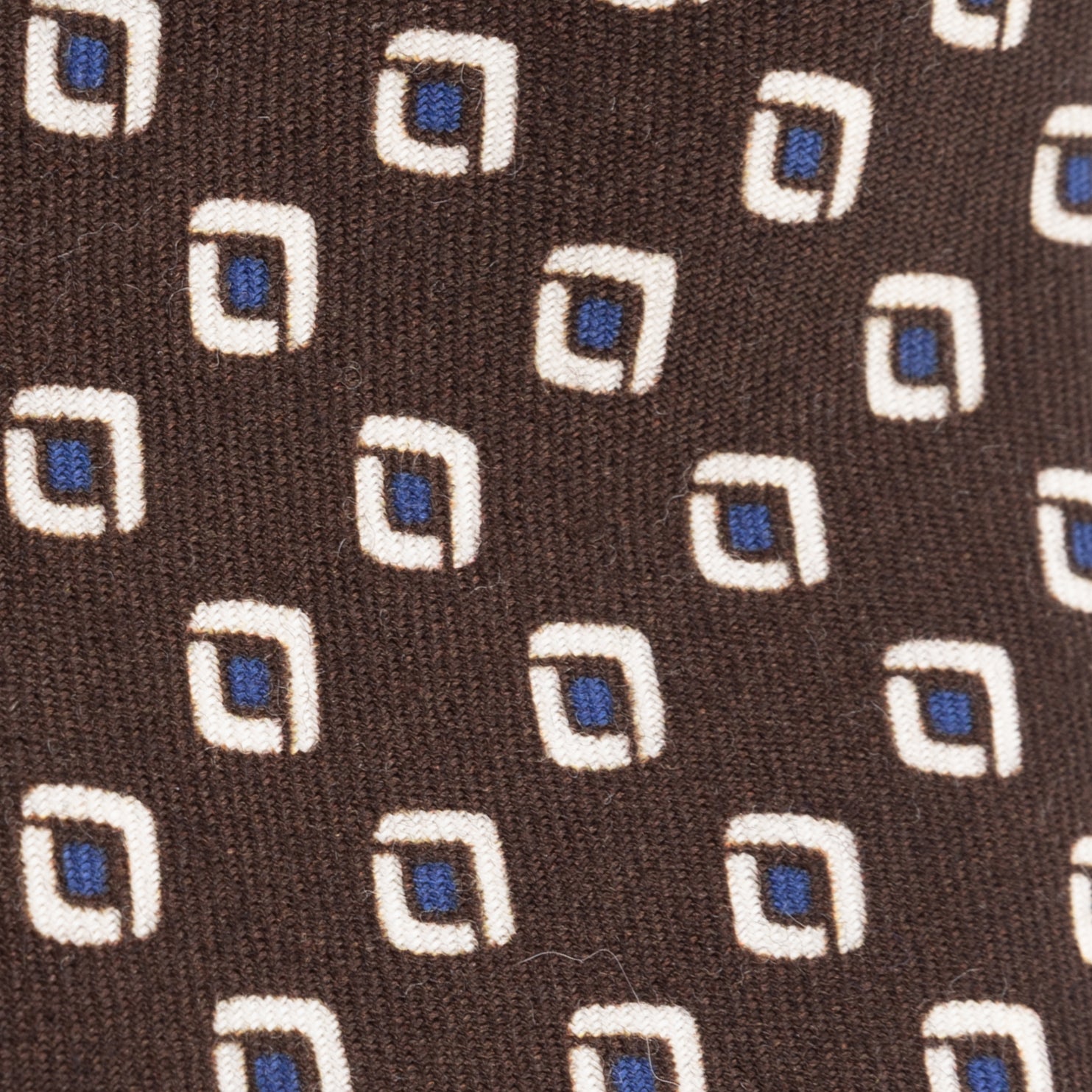Brown tie with geometric pattern in pure wool