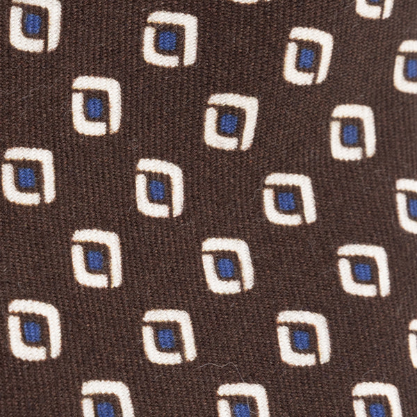Brown tie with geometric pattern in pure wool