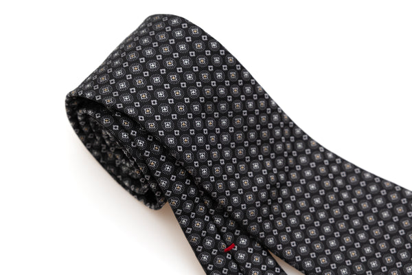 Cravatta nera in seta pura con motivo chiaro