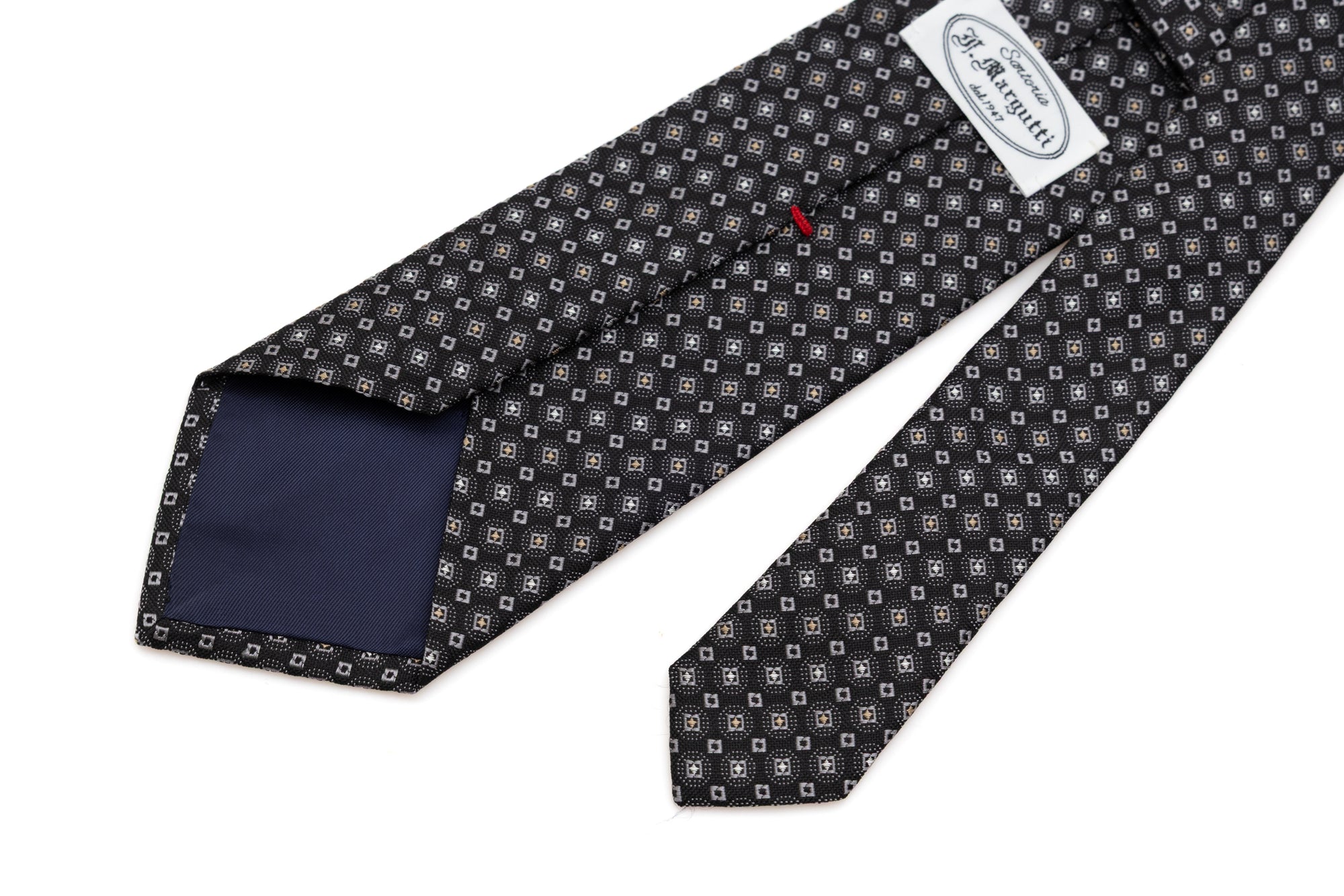 Cravatta nera in seta pura con motivo chiaro