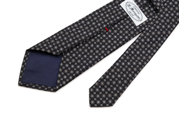 Cravatta nera in seta pura con motivo chiaro
