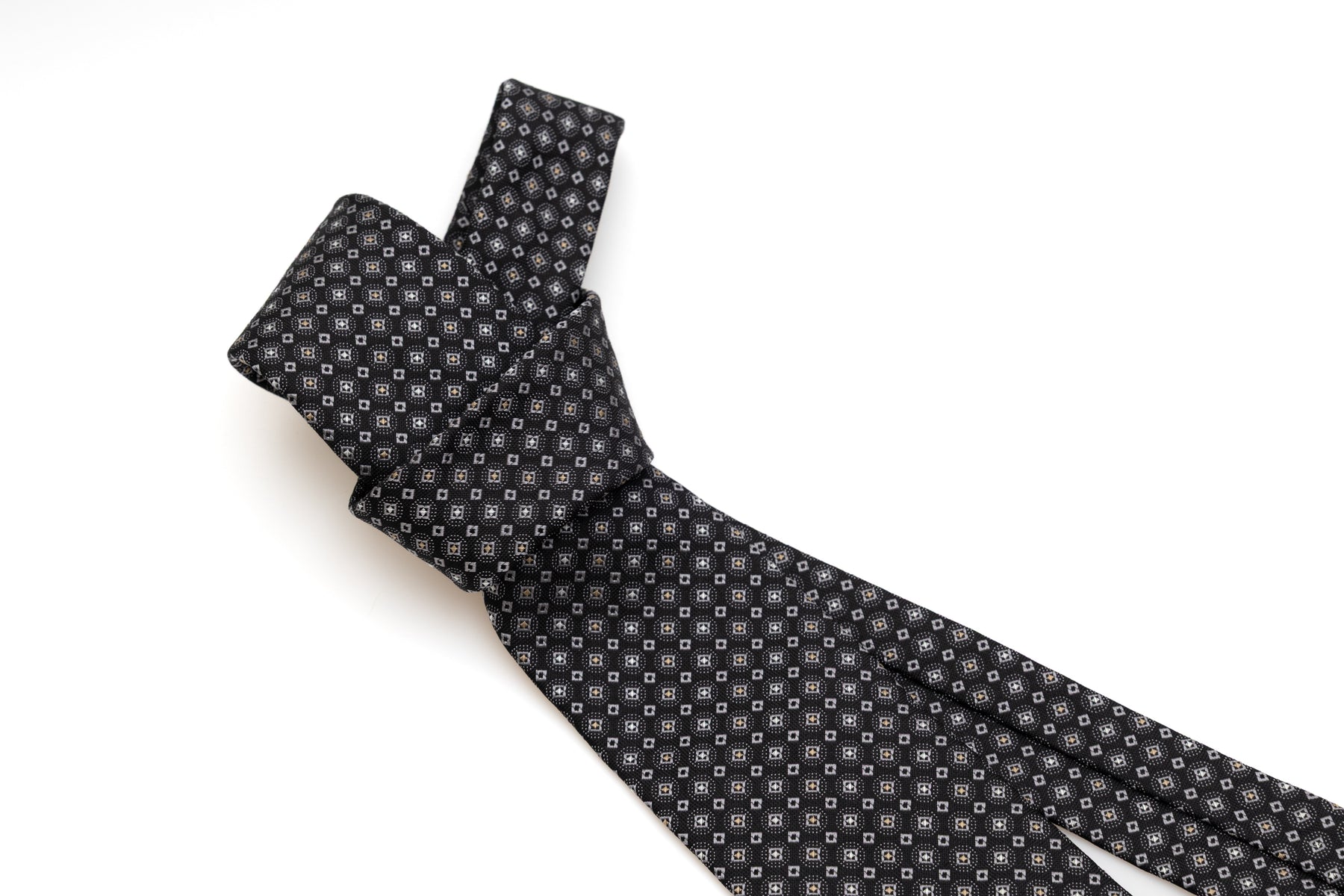 Cravatta nera in seta pura con motivo chiaro